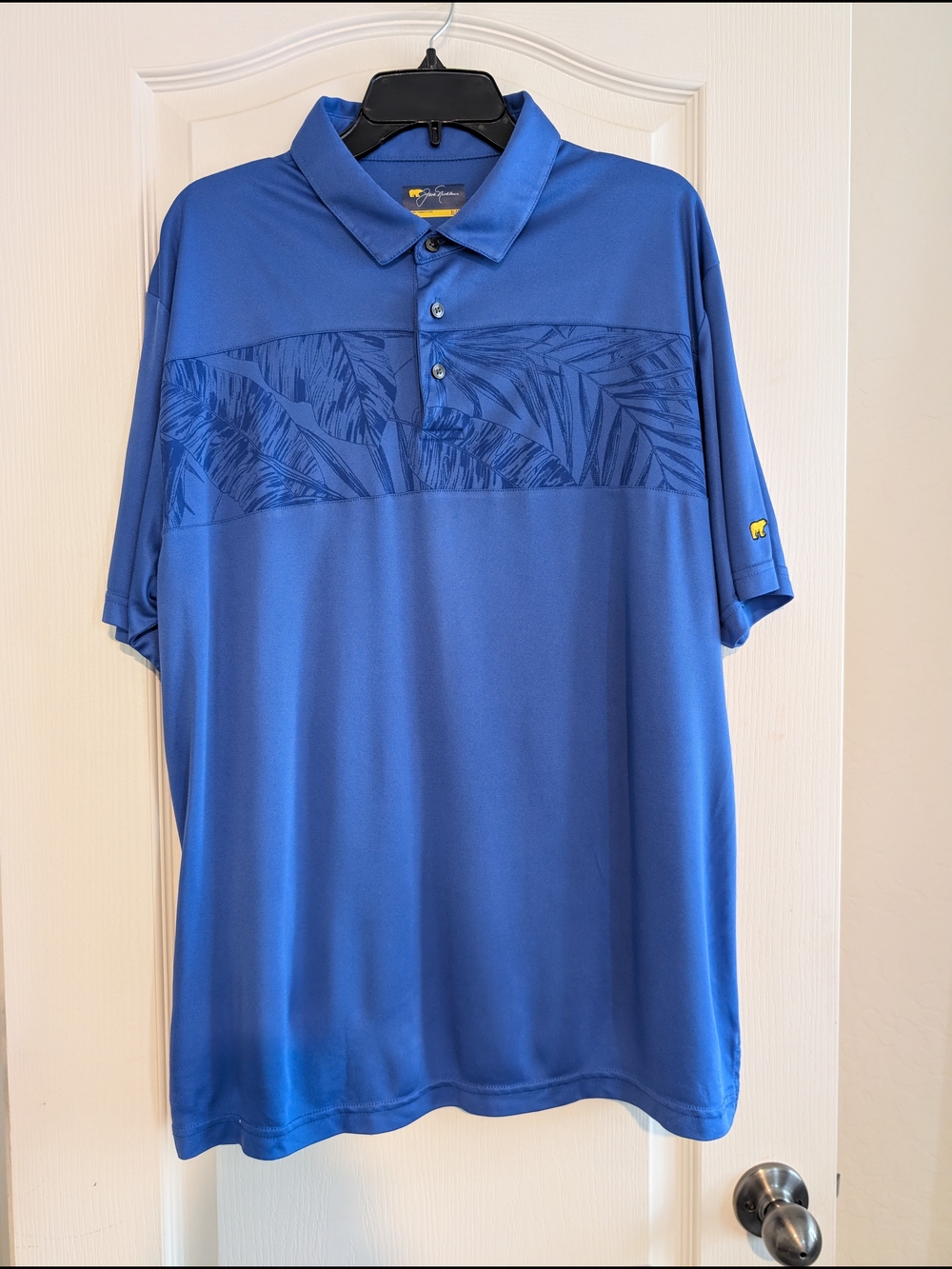 Men's Jack Nicklaus blue Polo with Tropical Chest Panel